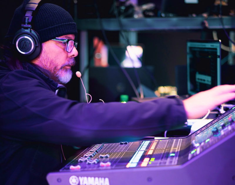 Employee in control room at a trade show